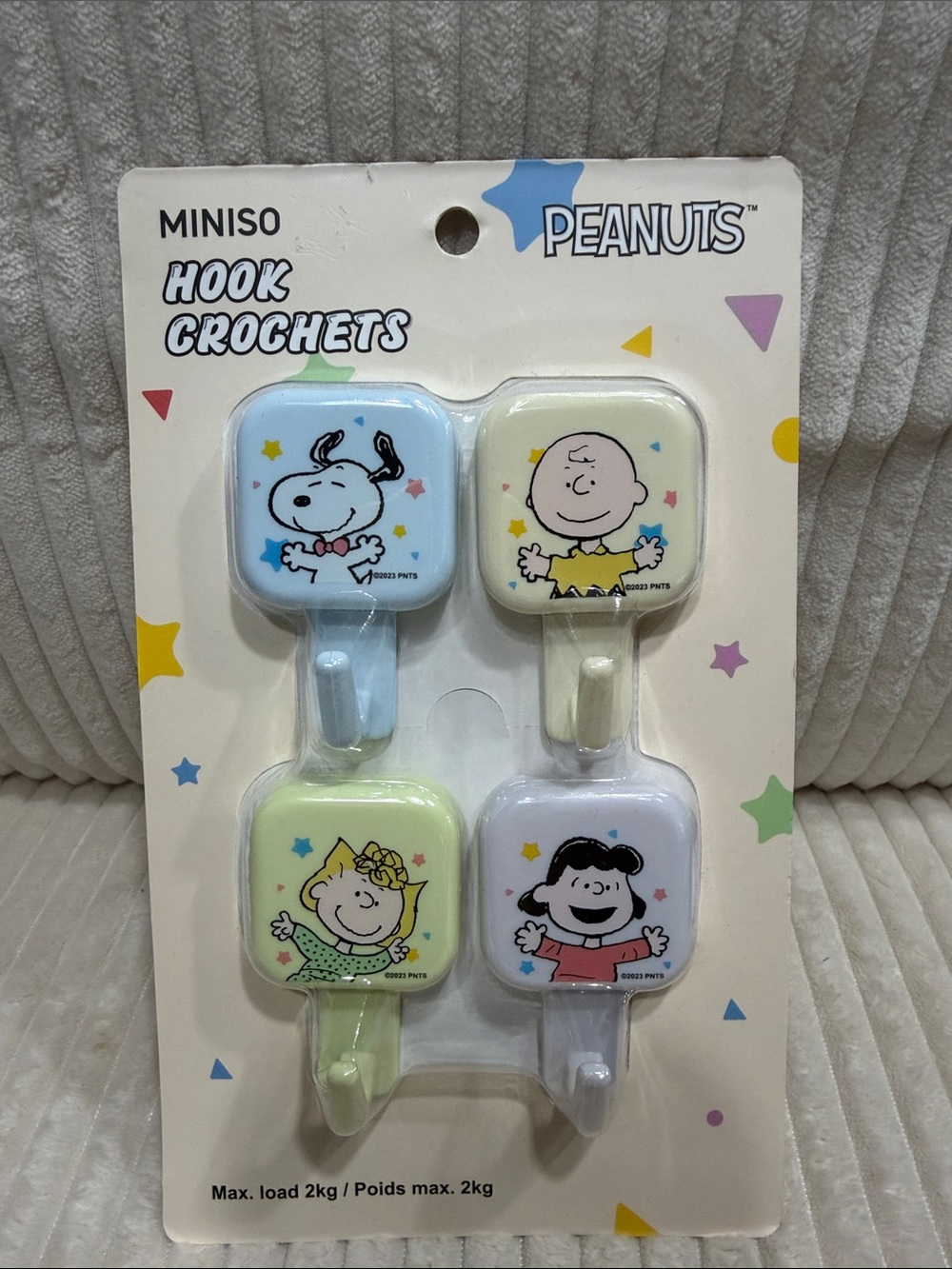Peanuts Kids Adhesive Hooks - Set of 4 (Blue, Cream, Light Green, White). New